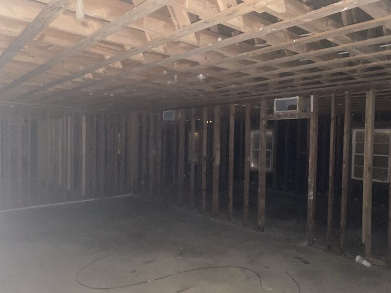 Stripped walls and ceiling of interior facility